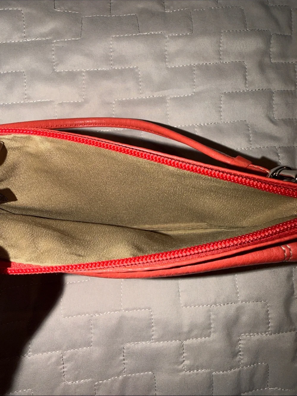 Coach Hamilton Pebbled Leather Flap Wristlet in Geranium Coral